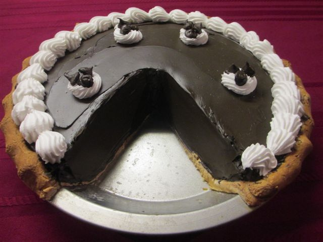 Dark Chocolate Cream Pie with Slice out 