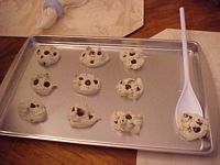 Cookie sheet w cookies and spatula