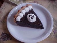 Slice of dark chocolate cream pie