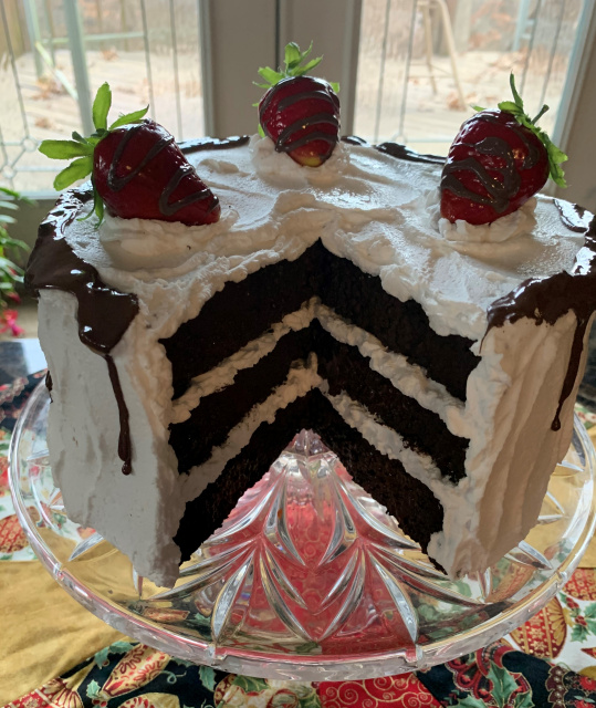 Dark Chocolate Cake with Slice out and Chocolate Drizzle 