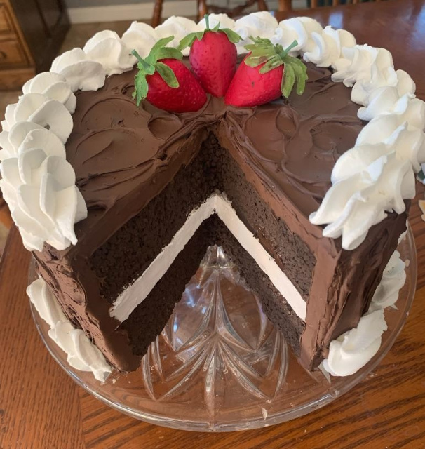 Luscious Chocolate and Vanilla Cake with Slice out