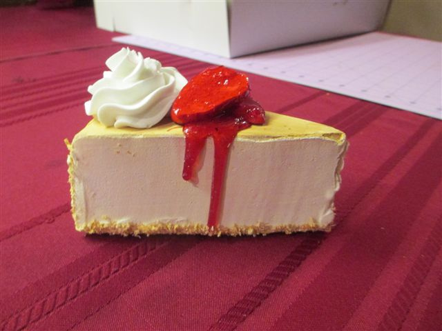 Cheesecake Slice topped with Strawberry Halves