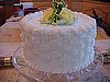 White with Yellow Rose Basket Weave Cake