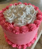 Creamy White Topped Whipped Light Pink Cake